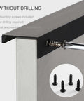 Installation of Sleek Black Aluminum Furniture Handles Set for kitchen cupboards, 600mm, showing screws and handle detail.