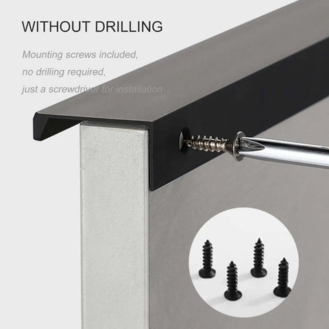 Installation of Sleek Black Aluminum Furniture Handles Set for kitchen cupboards, 600mm, showing screws and handle detail.