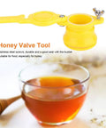 Leak Proof Honey Gate Valve Kit With Precise Flow Control for easy bottling in beekeeping, yellow nylon valve above honey jar