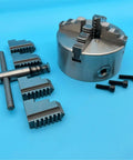 Rock Solid 130Mm Four Jaw Self Centering Lathe Chuck K12-130 with jaws and tool for mini metal lathe projects.