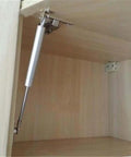 Soft Close Safety Hinges For Toy Box And Furniture Cabinets With Gas Spring Telescopic Rod Iron Head Design installed in cabinet