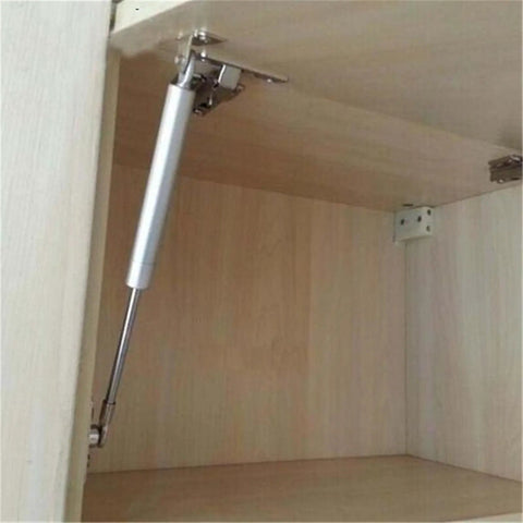 Soft Close Safety Hinges For Toy Box And Furniture Cabinets With Gas Spring Telescopic Rod Iron Head Design installed in cabinet