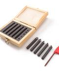Oudtinx 5-piece carbide turning tool set with 1/4 inch shanks in a foam-lined wooden case; five indexable bars with carbide inserts.