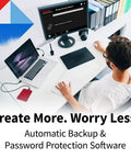 Man using Dope 2TB Portable External Hard Drive With USB 3.0 Red Finish on a desk, displaying automatic backup software.