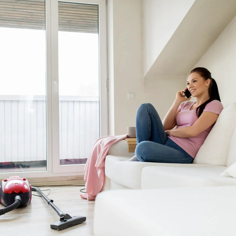 Woman on sofa near vacuum with 8 Pack Style C And Q Canister Vacuum Bags Replacement For Kenmore 50104 5055 50557 50558 Type C 5 Vacuums