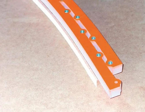 Bendable Routing Template For Smooth Sailing Arcs And Curved Woodworking 23 32 X 23 32 Inch Durable Plastic Router Jig on MDF surface.