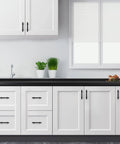 Modern kitchen with Matte Black 25 Pack Cabinet Handles 3 Inch Hole Centers 5 Inch Overall Length Square Base Drawer Pulls