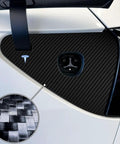 Premium Carbon Fiber Charge Port Wrap For Tesla Model 3 And Model Y Featuring Dope 3D Textured Surface and installed on vehicle.