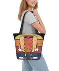 Woman carrying large capacity lightweight tote bag with hotdog design, polyester material, ideal for work, travel, and shopping.