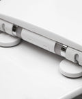 Close-up of hinge mechanism on LED Nightlight Elongated Toilet Seat in White for Easy Night Time Use Snug Fit for All Elongated Toilets