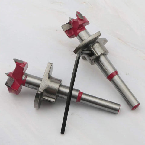 Two Pro Level 5 Piece Forstner Drill Bit Set Covering 15 To 35mm with sharp edges and high carbon steel alloy construction.