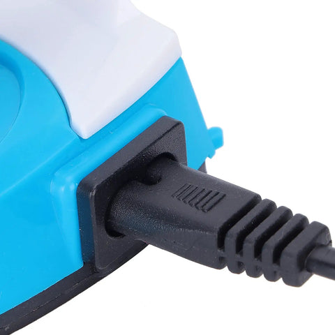 Close-up of Luocute Mini Iron For DIY Heat Transfer Projects Features Rapid Preheating and Constant Temperature Control power plug.