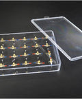Hands-On Magnetic Molecular Model Kit With 24 Steel Needles In A Clear Cuboid Box shown open on a black background
