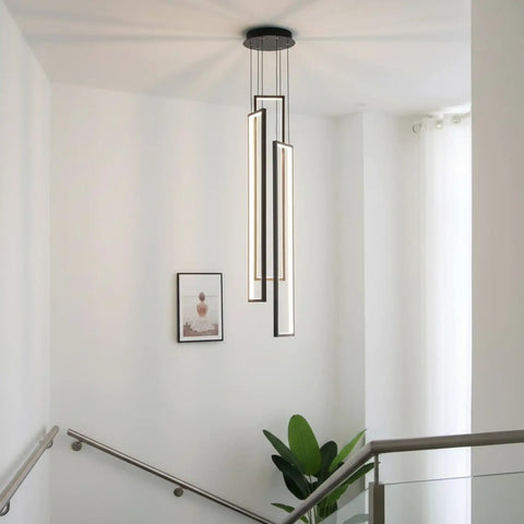 Sleek Modern LED Chandelier With Three Lights Black Kitchen Island Pendant For Living Room Dining Room Foyer Remote Dimmable High Ceiling Fixture 33 Inch Tall 6 Inch Wide hanging in stairwell