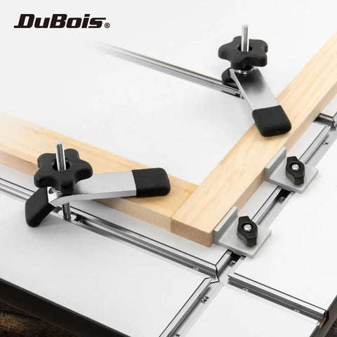 Heavy Duty Universal Aluminum T Track Four Pack with clamps on wood, showcasing predrilled mounting holes for woodworking.