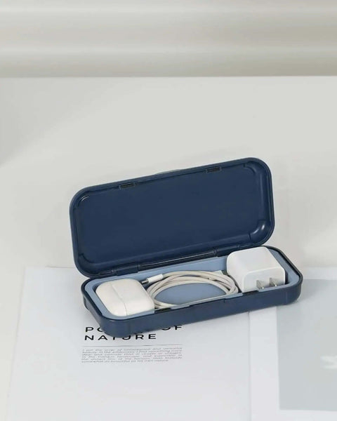 Clutch Tech Organizer Case With Magnetic Abs Build And Smooth Silicone Tray For Straight Up Cable Sorting and Apple charger inside.
