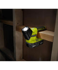 18V LED Flashlight With 130 Lumen Output, Battery Not Included, mounted on wooden beam, ideal for worksite lighting