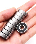 Premium 608RS bearings 2RS in hand, perfect for DIY projects, skateboards, and 3D printers. Durable chrome steel, pre-lubricated for smooth rolling.