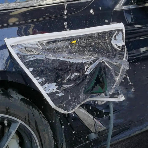 Keep Your EV Port Dry As A Bone With This Hella Tough Magnetic Cover Featuring Waterproof All Season Shield Clear Fit For Steel Bodied Electric Rides In Clean White Finish, shown on a steel EV with water droplets.