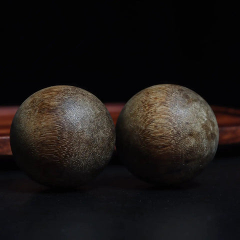 Dope Vietnam Nha Trang Agarwood White Aquilaria Old Growth Raw Material wooden spheres for wellness accessories on dark background