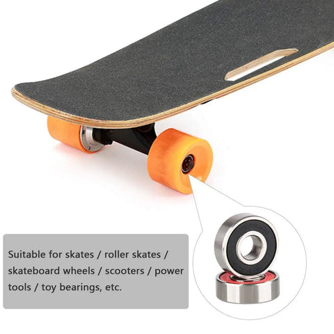 Skateboard with orange wheels featuring 20 Pack 608RS Ball Bearings Double Rubber Sealed Deep Groove 8x22x7mm for skates and scooters.