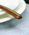 Close-up of a spoon from Six Piece Japanese Natural Wooden Spoons Set For Cooking And Eating Great For Stirring Tea Honey Soda Dessert And Nonstick Pots