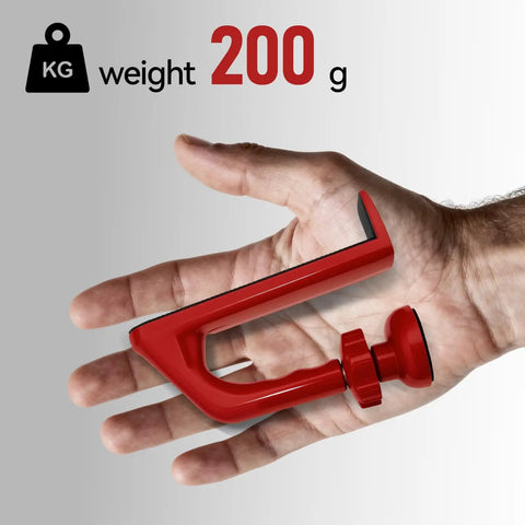 Hand holding Red Aluminum Alloy Portable Door Stopper With Diamond Anti Slip Base For Travel And Apartment Living Easy To Use Security Device That Locks Down Unauthorized Entry And Pry Attempts