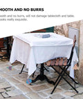 Alloy Tablecloth Clips Eight Pack 2.36 Inch Wide Non Slip Outdoor Tablecloth Holders on patio table with butterfly charms