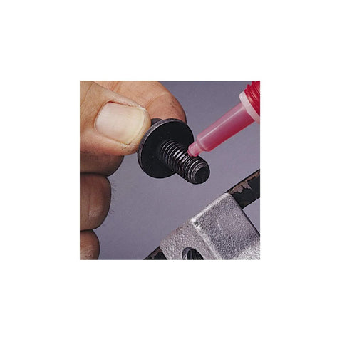 Loctite red high-strength threadlocker on a metal bolt, close-up view
