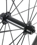 Spokes and hub detail of Pro Grade Carbon Fiber Road Bike Wheels 50mm Clincher Wheelset 700C Racing Aero Beasts With Shimano Hub Body.