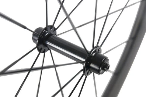 Spokes and hub detail of Pro Grade Carbon Fiber Road Bike Wheels 50mm Clincher Wheelset 700C Racing Aero Beasts With Shimano Hub Body.