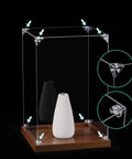 Real Deal 24 Piece Clear Acrylic Corner Bracket Kit on display case with clear brackets and decorative vase.