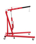2 Ton Cherry Picker Engine Hoist Folds Flat To Save Bay Space Rolls Smooth On Six Heavy Duty Casters Includes Hand Pump For Garage Crew Auto Projects 4400 Lb, red metal structure with hydraulic arm.
