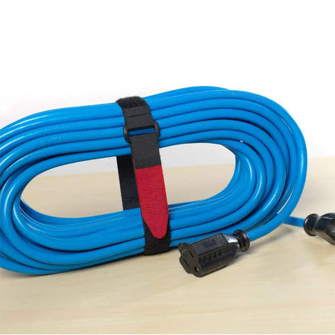 All Purpose Cable Straps 18 Inch By 1 Inch 2 Pack Black For Cable Management At Office Data Center Home Or Truck Quick Wrap Reusable Hook And Loop Tie Downs securing blue cable on table.