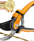 Effortless Garden Pruning Shears With Ultra Sharp Blades and Adjustable Comfort Handles cutting a branch, corrosion-resistant.