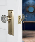 Crystal Door Knob With Long Back Plate In Waldorf And New York Style Finish, solid brass with a sparkling crystal knob, door view.