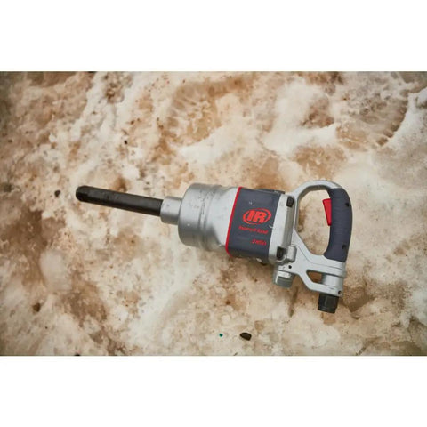 Pro Level One Inch Drive Air Impact Wrench Crafted For Boss Garage Tasks, silver and black durable design on snow.