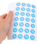 Ground Wire ID Labels 200pc Set For Electrical Boxes And Control Panels, PVC Stickers With International Standards, Universal Indoor And Factory Use, Earth Ground, Neutral, Phase Tags; hand holding N labels sheet