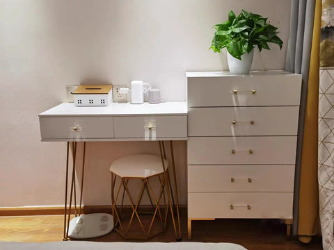 Bedroom dresser with adjustable acrylic and brass cabinet pulls in modern gold and clear finish, adorned with DIY knobs for storage furniture.