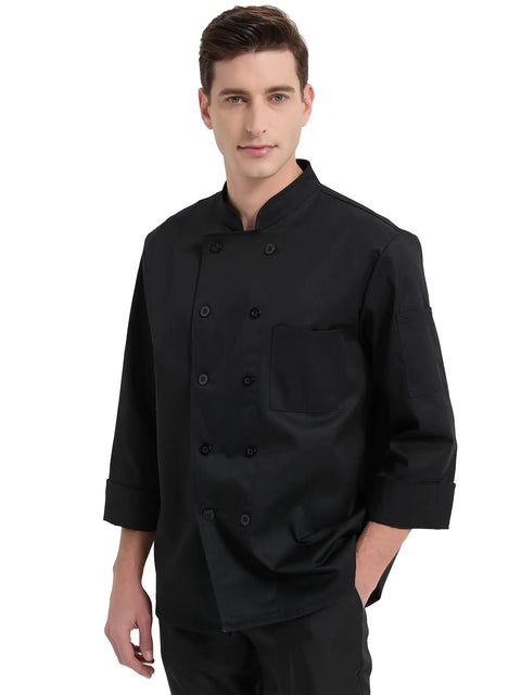 Kick Your Cooking Up With This Slick Long Sleeve Chef Coat Featuring Breezy Breathable Fabric Double Breasted Buttons And A Handy Sleeve Pocket Snag This Solid Black Restaurant Uniform For Intense Kitchen Heat Shift Ready Wear, model wearing black chef coat.