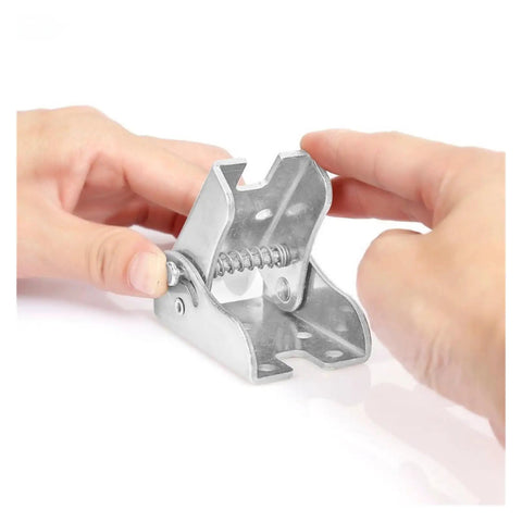 Hands holding Beefy Heavy Duty 90 Degree Self Locking Folding Sofa Bed Hinge Set, galvanized steel bracket with spring mechanism.