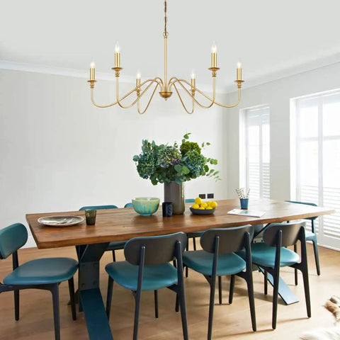 6 Light Gold Finish Chandelier, Vintage Candle Style Farmhouse Ceiling Light in dining room setting with modern rustic decor.