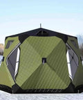 Portable Hexagon Ice Fishing Shanty Tent With Integrated Stove Jack Thick Thermal Insulation Soft Carpet Floor Multi Zone Vents front view in winter.