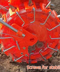 Close-up of orange wheel component of Hand Push Double Row Garden Seeder Manual Seed Dispenser with eight outlets for precise planting.