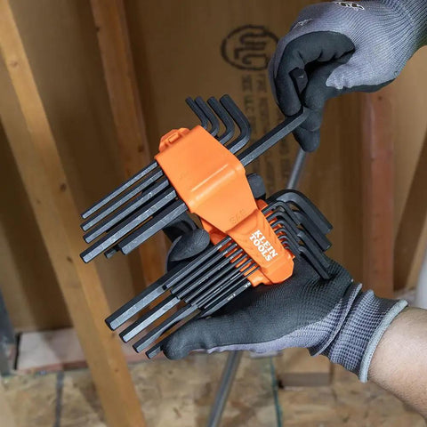 Person holding Heavy Duty 22 Piece Long Hex Key Set SAE And Metric Heat Treated L Style Allen Wrenches for auto projects