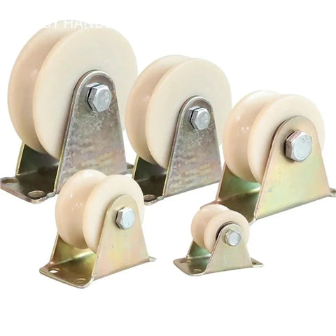 Heavy Duty Nylon V Groove Wheel With Rock Solid Steel Pulley For Sliding Gate Caster And Wire Rope Guide Roller Built Like A Tank For Crane Tracks And Seamless Daily Driver Trolley Cruising - four sizes of nylon wheels with metal frames.