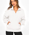 Model in Women Half Zip Oversized Sweatshirt Fleece Hoodie With Plush Lining Cozy Long Sleeve Pullover Top For Fall Travel Y2K Vibe Trendy 2026 Wardrobe Essential White Size M, hands in pockets