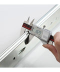 Measuring the width of Heavy Duty 12 Inch Drawer Slides With Lock Full Extension Ball Bearing Runners for precise fitting.