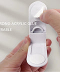 Close-up of 4 Pack Kid Safe Cabinet Locks Peel And Stick Drawer Latches No Drill Child Proof Clips quick release mechanism.