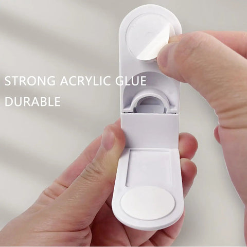 Close-up of 4 Pack Kid Safe Cabinet Locks Peel And Stick Drawer Latches No Drill Child Proof Clips quick release mechanism.